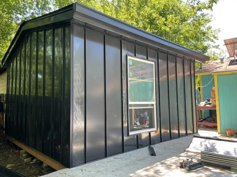 Black standing seam metal wall panels for Roof Inspection in Elkins