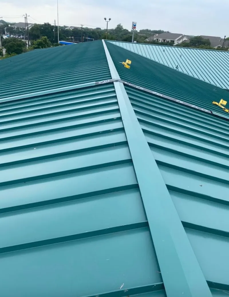 Green commercial metal roof ridge and valley for Metal Roof Repair in Elkins